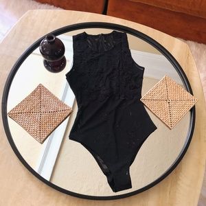 black sheer bodysuit floral appliqué